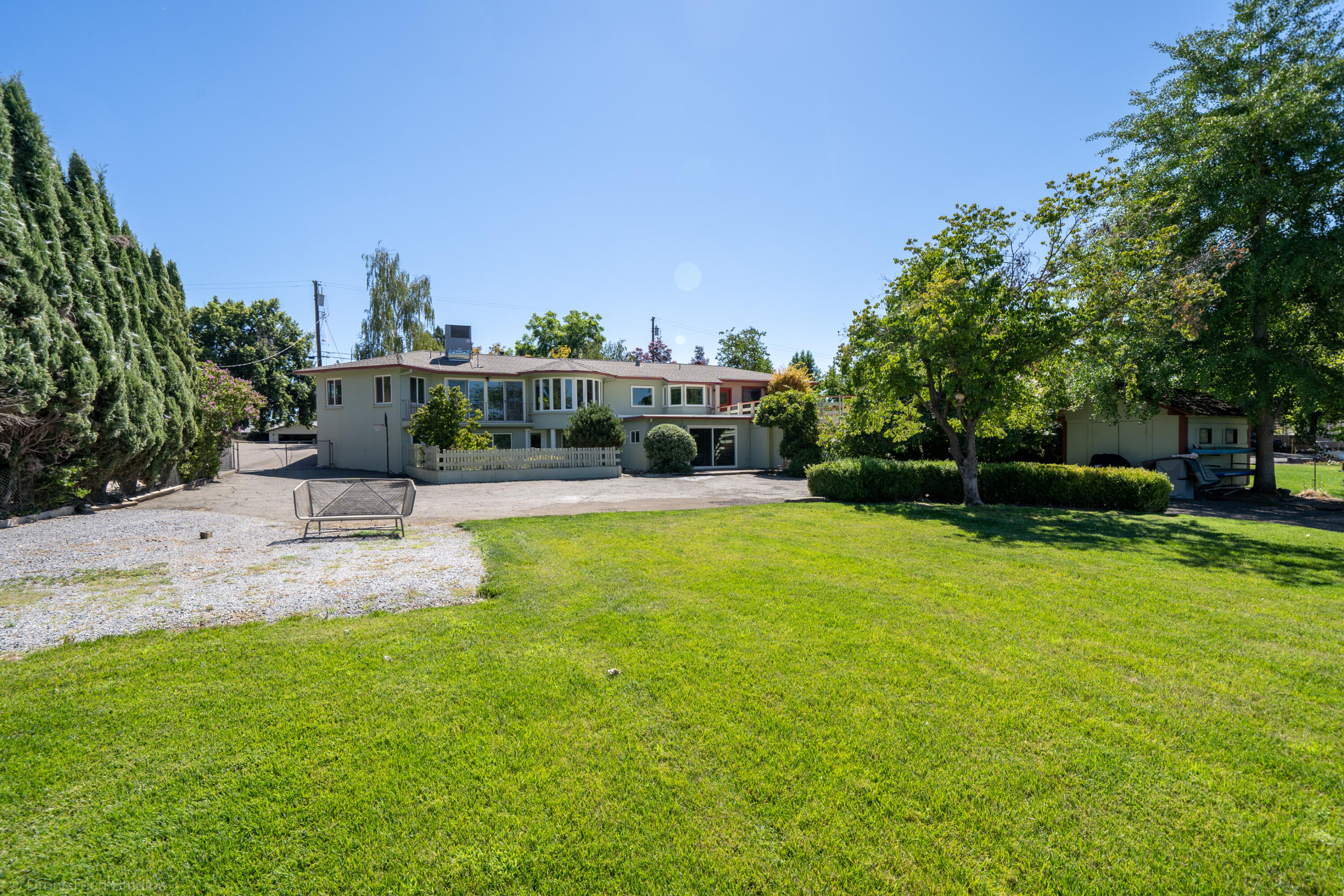 3274 Wilshire Drive Redding, CA 96002 - Photo 87 of 107 a view of a swimming pool with a patio