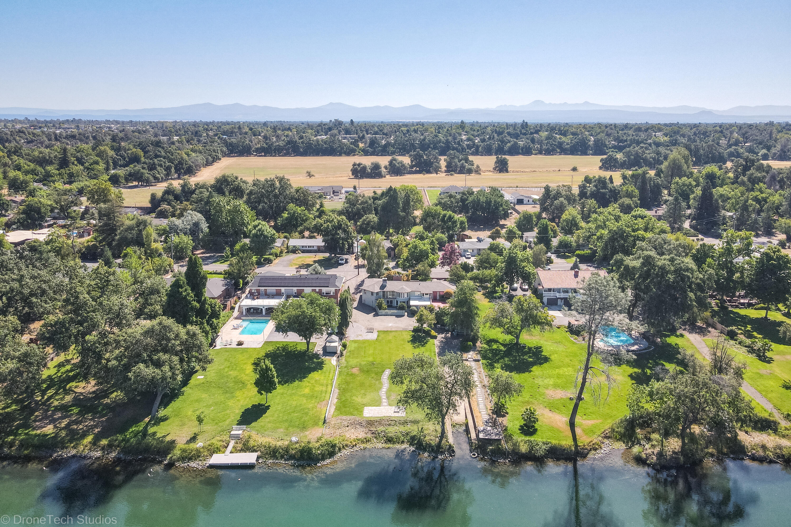 3274 Wilshire Drive Redding, CA 96002 - Photo 91 of 107 an aerial view of residential houses with outdoor space