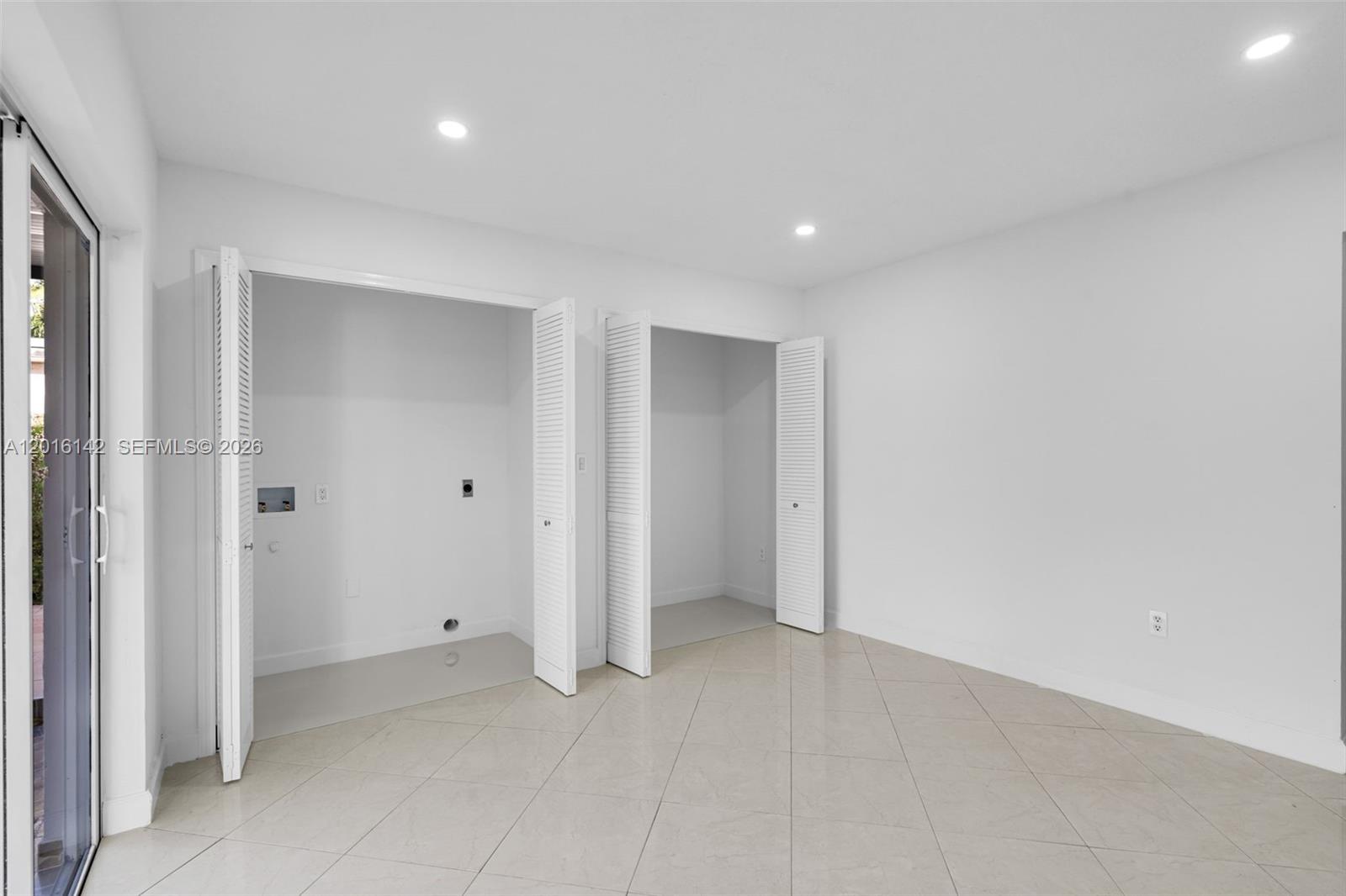 14755 Southwest 82nd Terrace Miami, FL 33193 - Photo 14 of 32 a view of an empty room