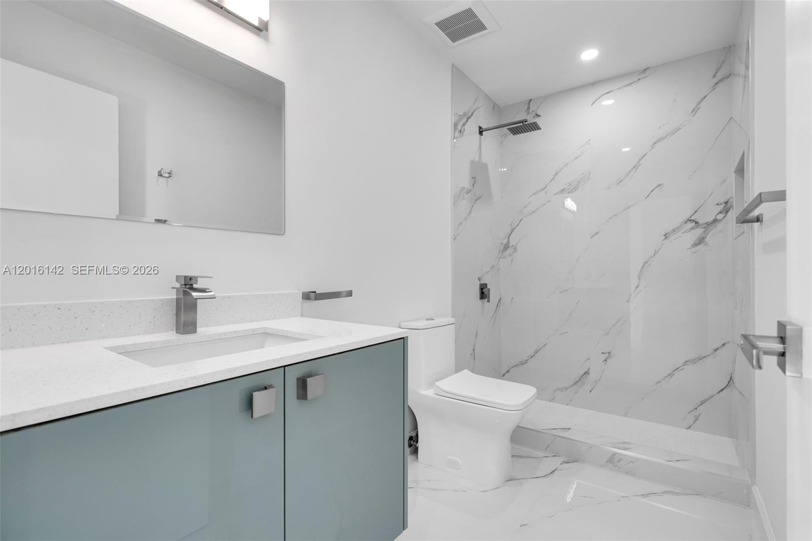 14755 Southwest 82nd Terrace Miami, FL 33193 - Photo 17 of 32 a bathroom with a sink toilet and shower