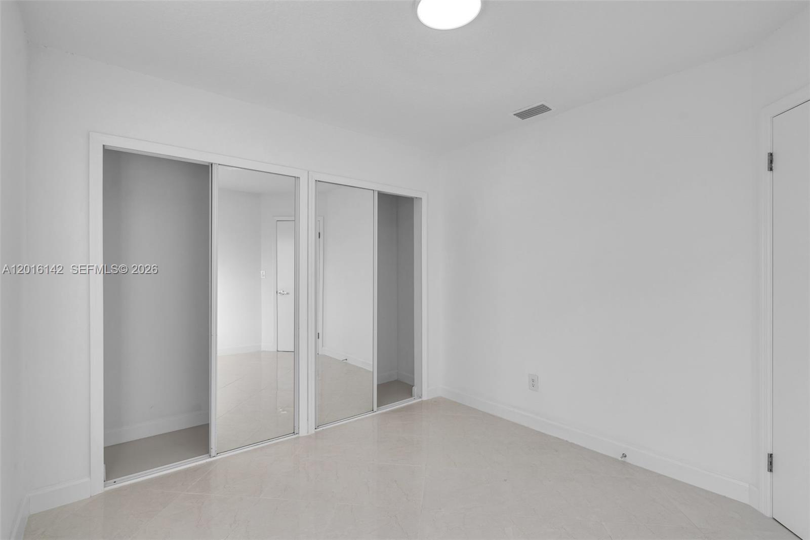 14755 Southwest 82nd Terrace Miami, FL 33193 - Photo 19 of 32 a view of an empty room
