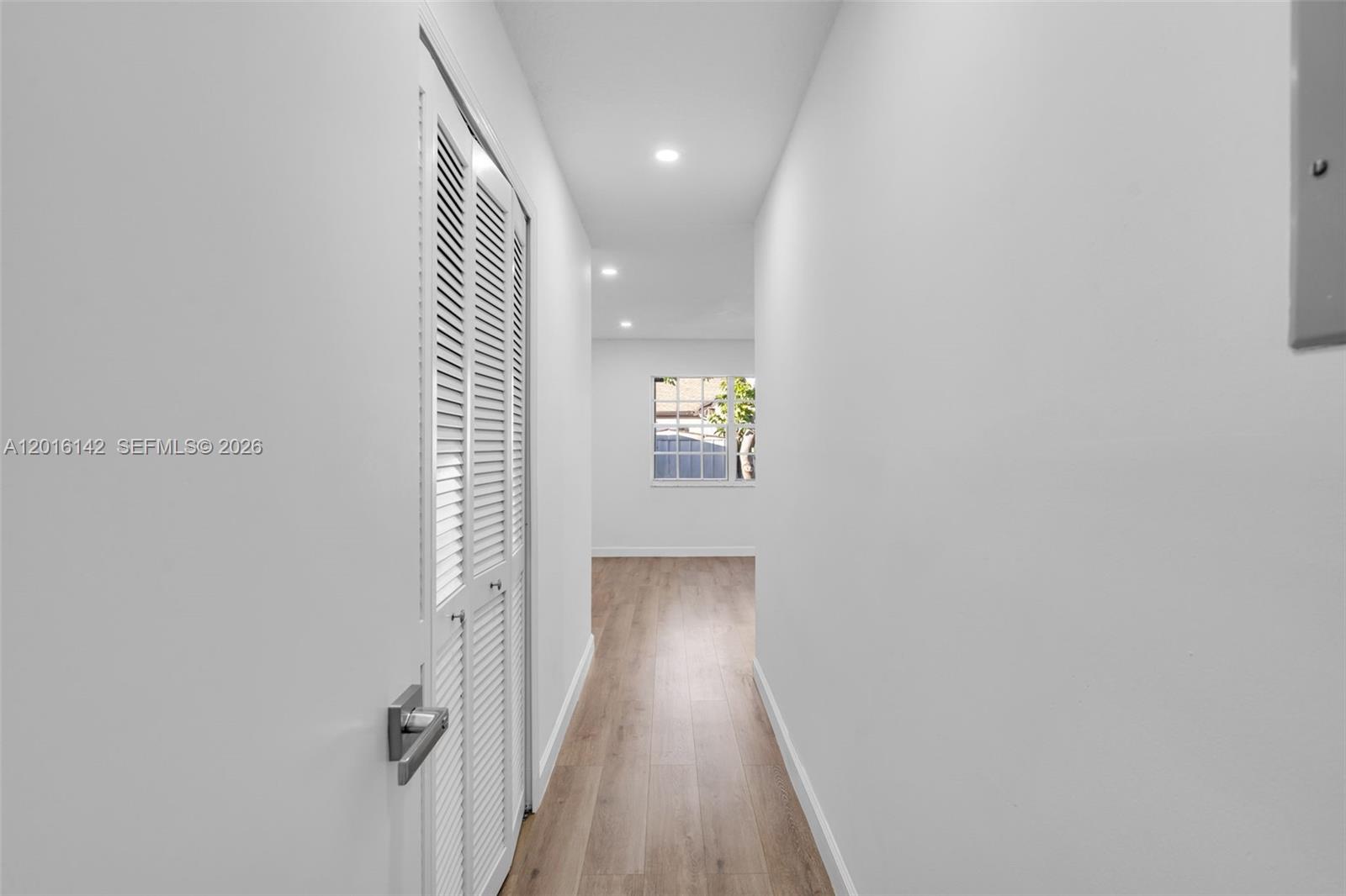 14755 Southwest 82nd Terrace Miami, FL 33193 - Photo 22 of 32 a view of hallway with wooden floor