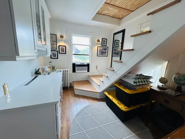 a living room with furniture and a table
