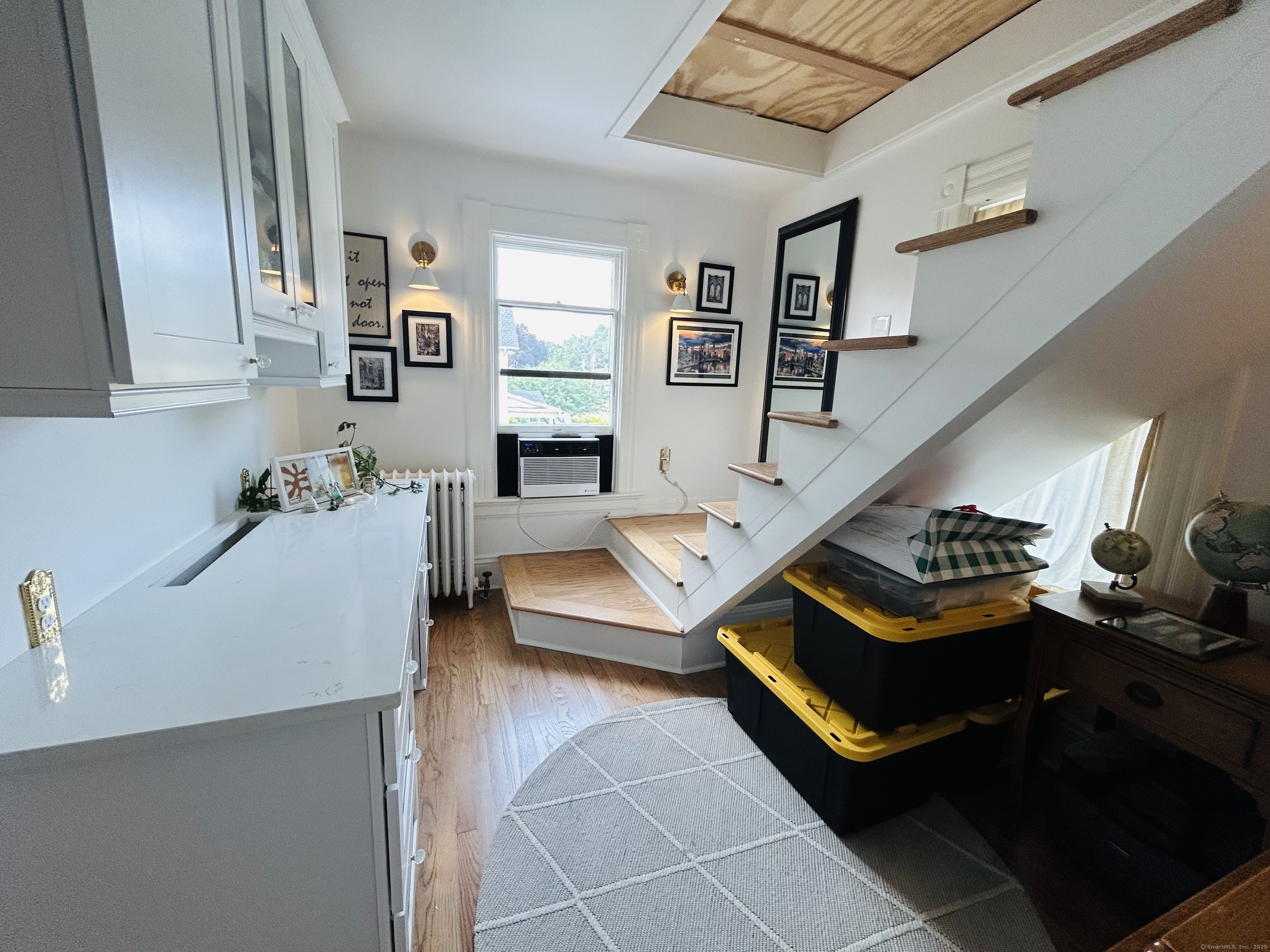 37 School Street Enfield, CT 06082 - Photo 12 of 15 a living room with furniture and a table