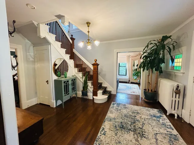a hallway with wooden floor