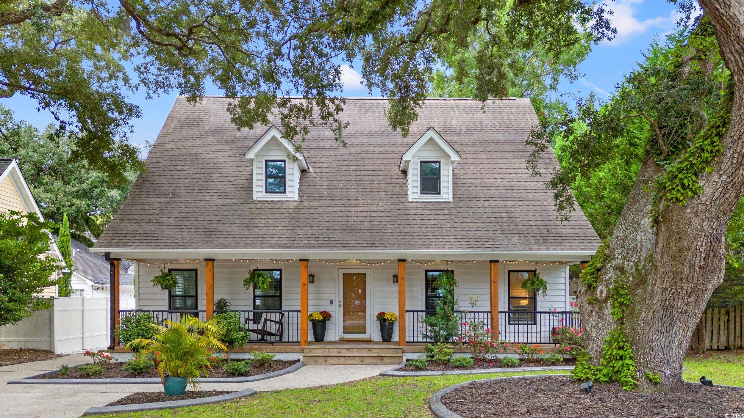 4268 Murrells Inlet Road Murrells Inlet, SC 29576 - Photo 1 of 40 Cape cod house with a porch