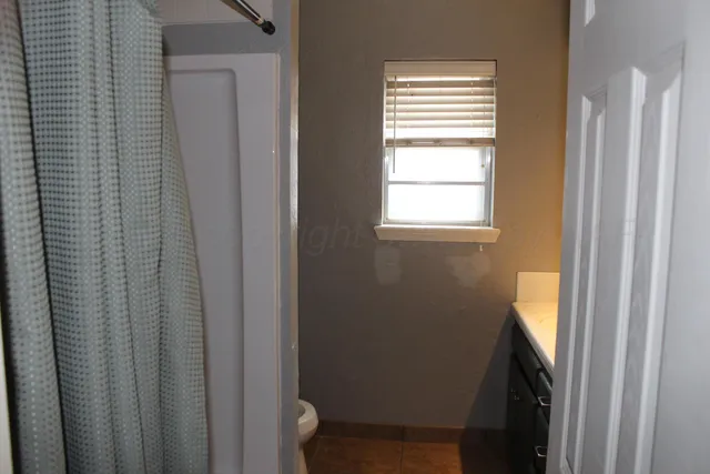 a bathroom with a window