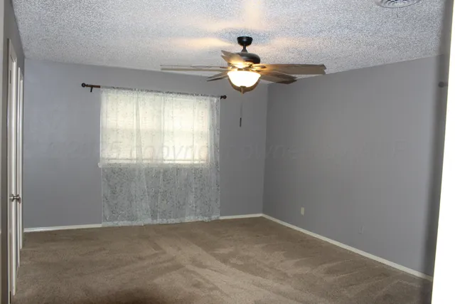 en view of an empty room with a window