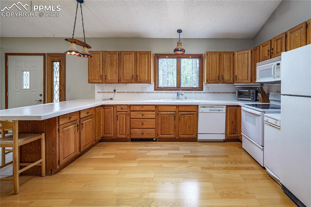 11020 Hardy Road Colorado Springs, CO 80908 - Photo 9 of 49