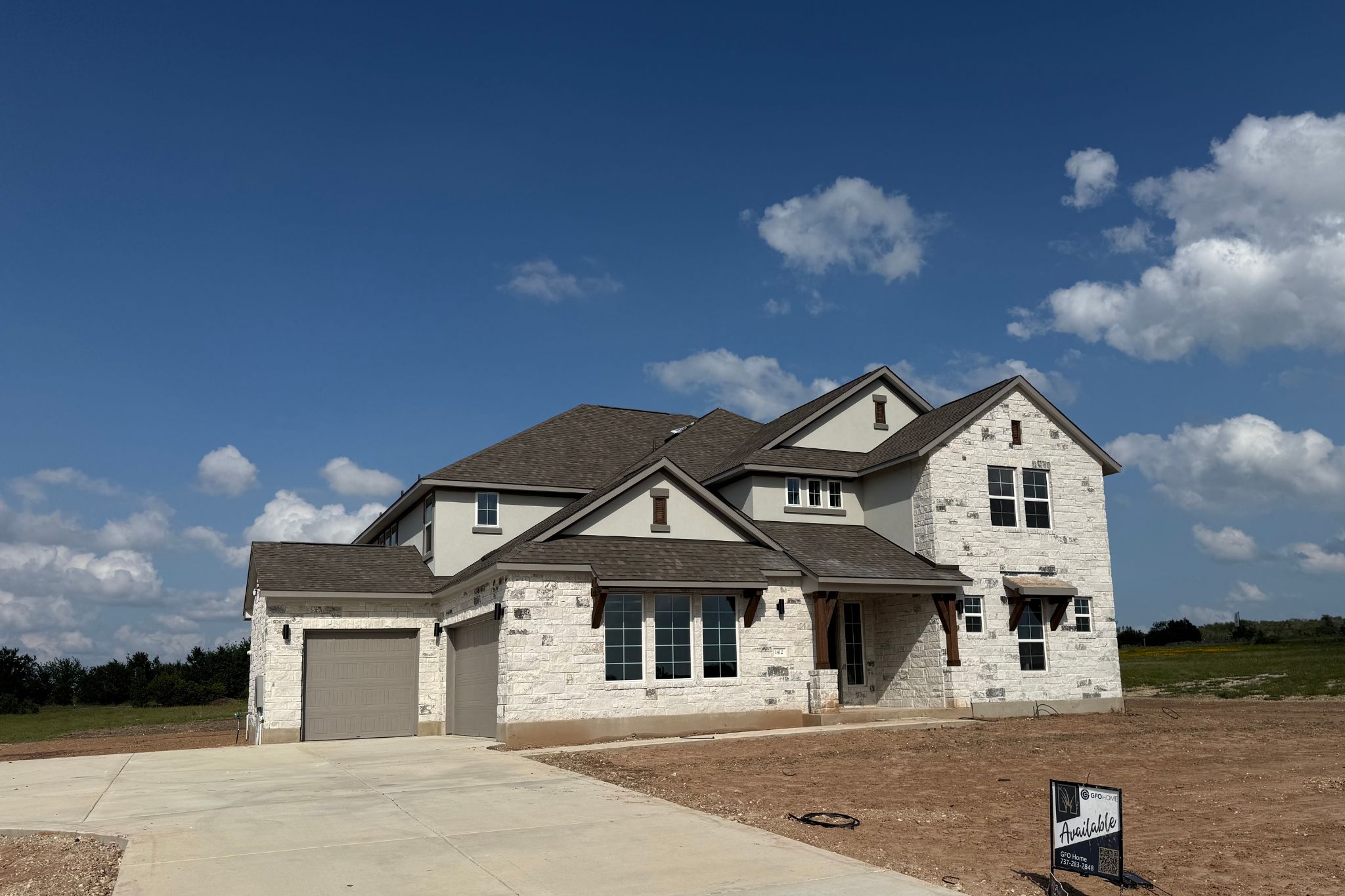 1412 Paxton Lane Georgetown, TX 78633 - Photo 2 of 14 a front view of a house with a yard