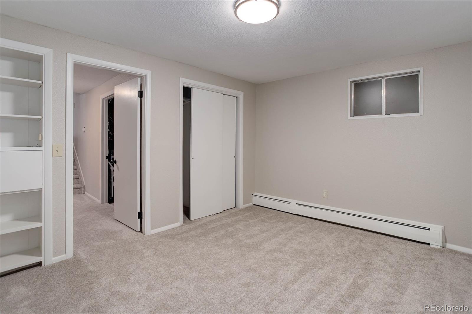 14650 Tejon Street Broomfield, CO 80023 - Photo 28 of 39 an empty room with windows