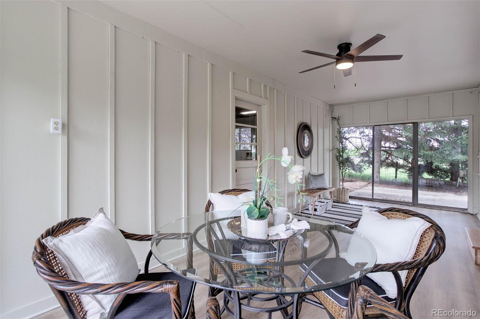 14650 Tejon Street Broomfield, CO 80023 - Photo 30 of 39 a view of a dining room with furniture window and outside view
