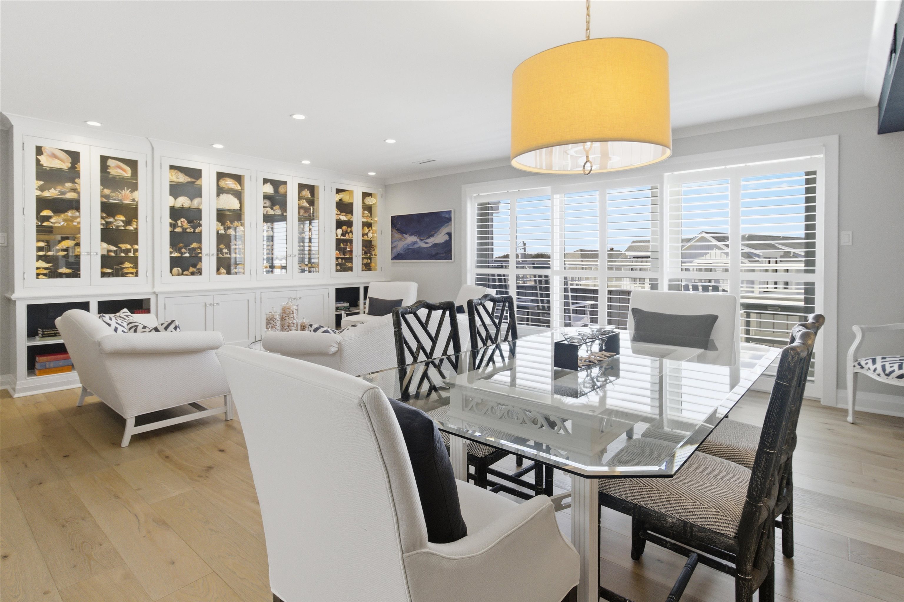 10803 3rd, Unit 6 Stone Harbor, NJ 08247 - Photo 12 of 25 a view of a dining room with furniture and wooden floor