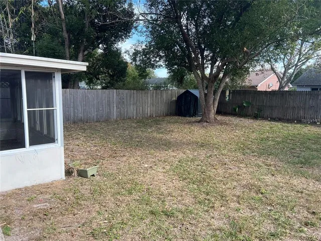 a house with trees in front of it