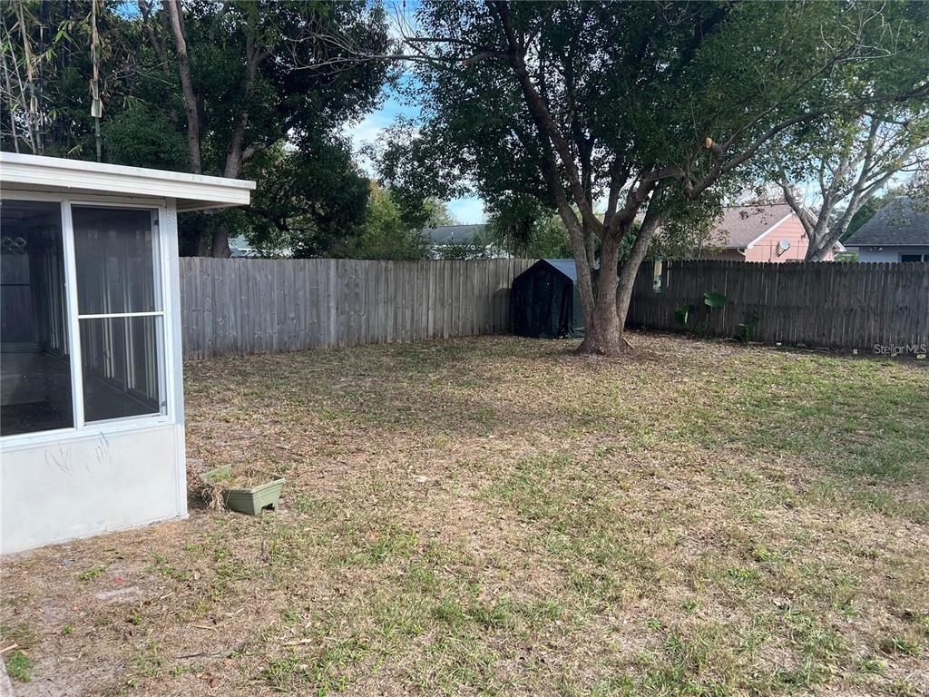 3350 Van Nuys Loop New Port Richey, FL 34655 - Photo 10 of 10 a house with trees in front of it