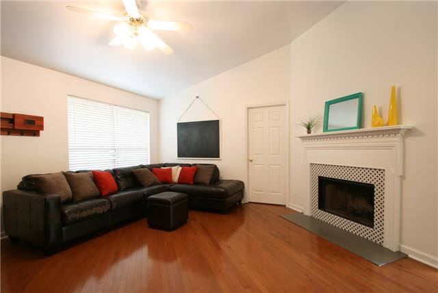 Beautiful hardwoods and stylish wood burning fireplace.