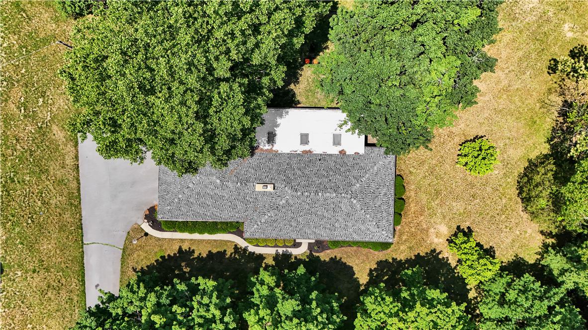 5747 Kernsville Road Orefield, PA 18069 - Photo 51 of 56 an aerial view of a house with a yard and large trees