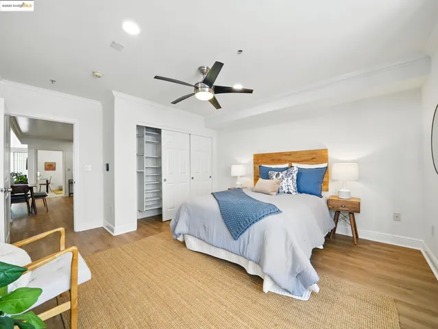 a bedroom with bed and window