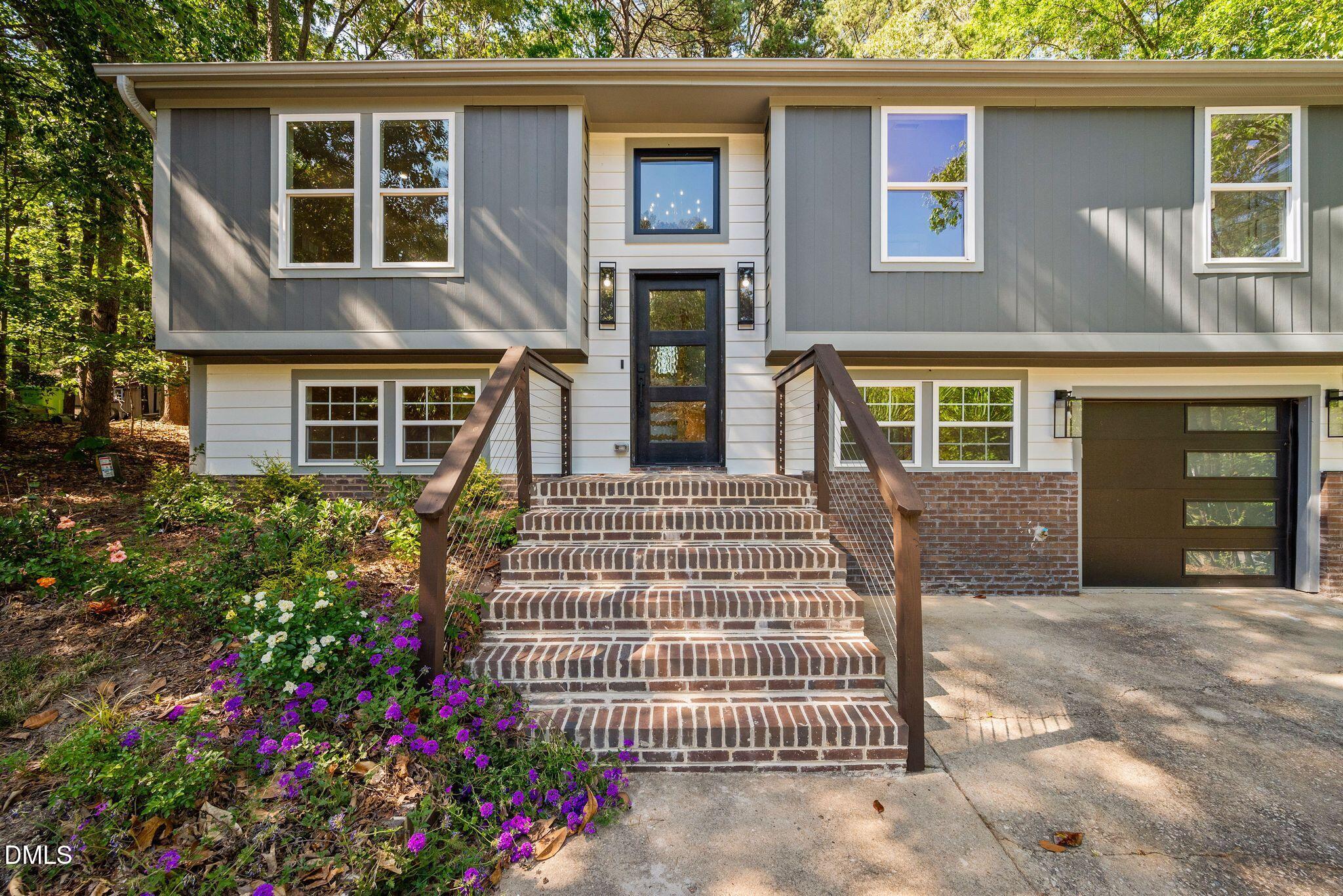 313 Crown Oaks Drive Raleigh, NC 27615 - Photo 3 of 60 front view of a house