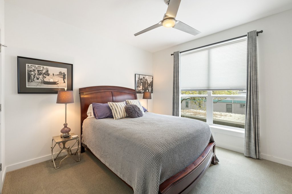 2003 Wilson Street, Unit 3 Austin, TX 78704 - Photo 19 of 27 a bedroom with a bed and a large window