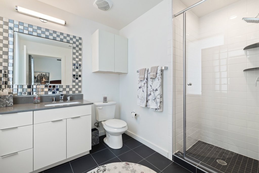 2003 Wilson Street, Unit 3 Austin, TX 78704 - Photo 20 of 27 a bathroom with a sink toilet and shower