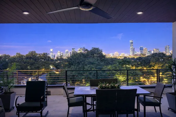 a view of a chairs and table on the terrace