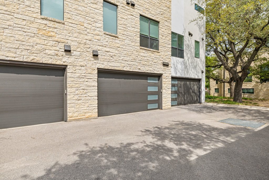 2003 Wilson Street, Unit 3 Austin, TX 78704 - Photo 27 of 27 a front view of a house with a yard and garage