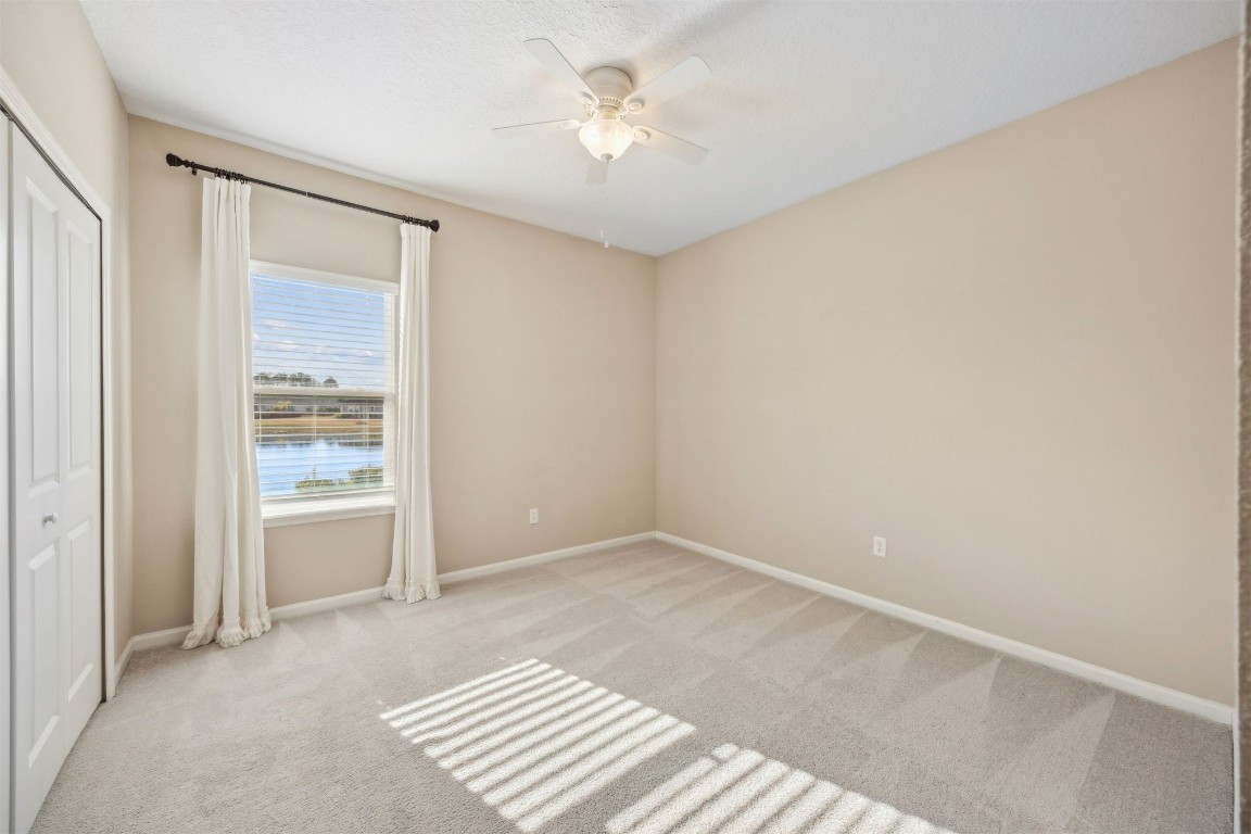 85237 Fall River Parkway Fernandina Beach, FL 32034 - Photo 28 of 82 a view of an empty room with a window
