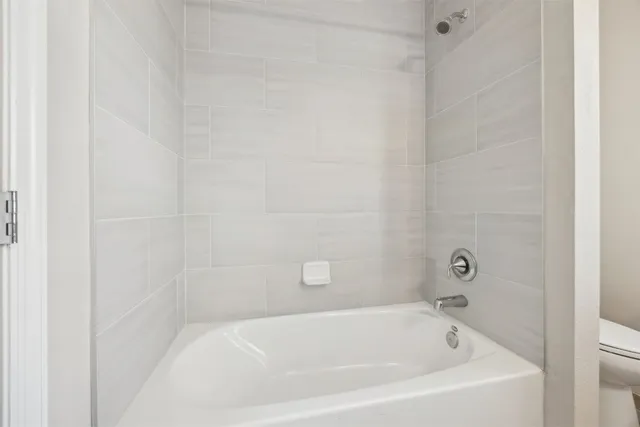 a view of a patio with swimming pool