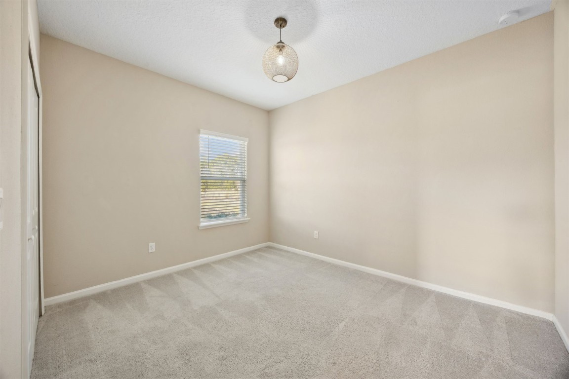 85237 Fall River Parkway Fernandina Beach, FL 32034 - Photo 32 of 82 a view of an empty room with a window