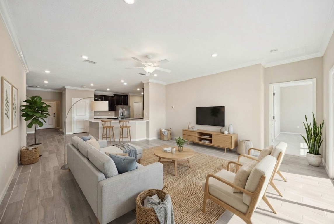 85237 Fall River Parkway Fernandina Beach, FL 32034 - Photo 4 of 82 a living room with furniture and a flat screen tv