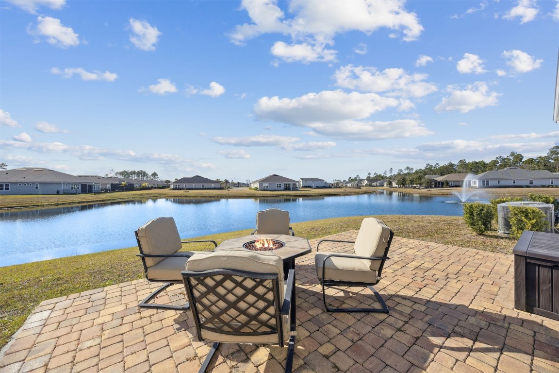 85237 Fall River Parkway Fernandina Beach, FL 32034 - Photo 41 of 82 a terrace with outdoor seating and city view