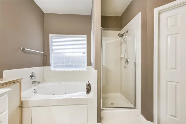 a workspace with furniture and a window