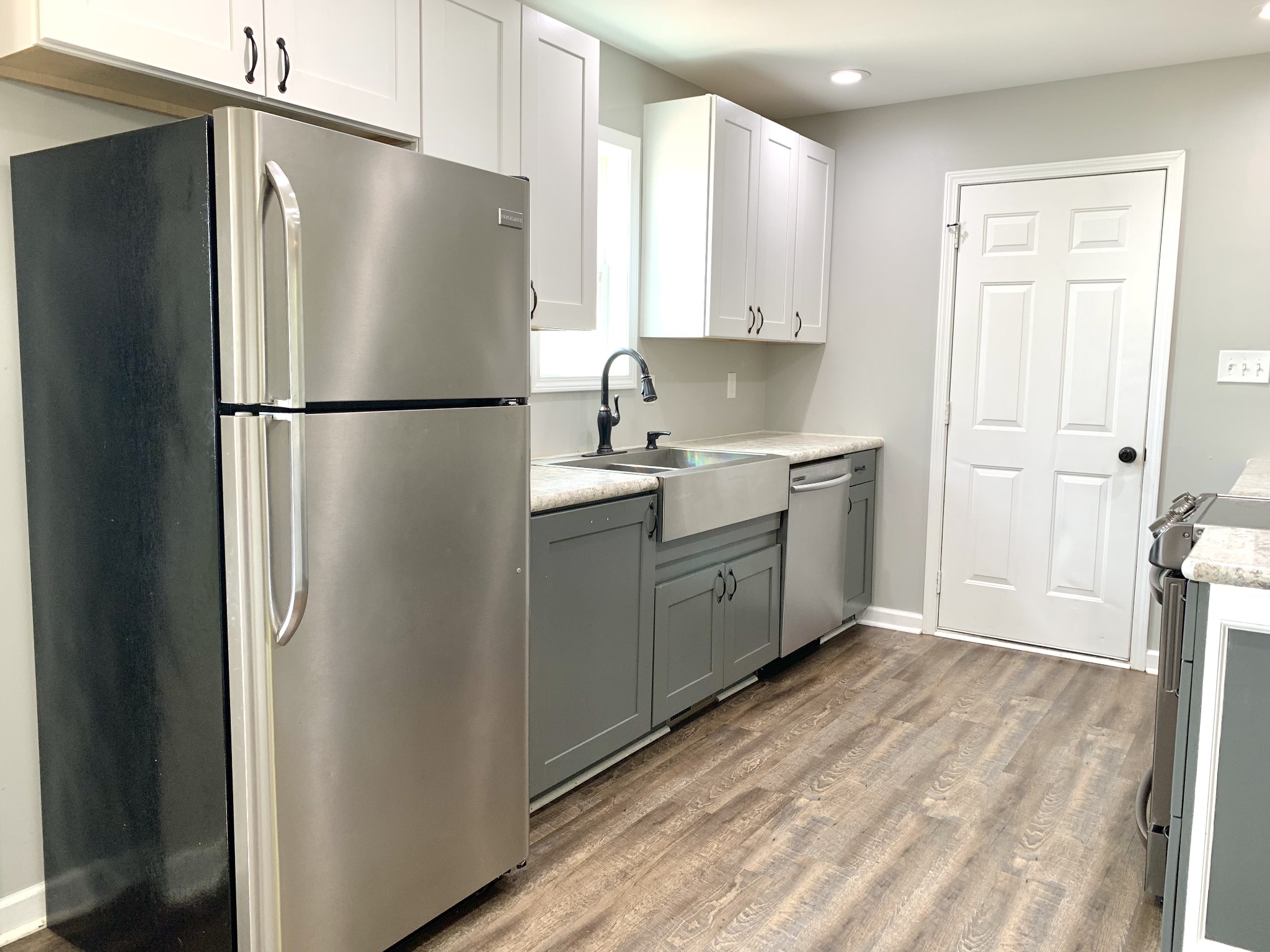 819 Stableford Road Oak Grove, KY 42262 - Photo 11 of 50 a kitchen with a refrigerator sink and cabinets