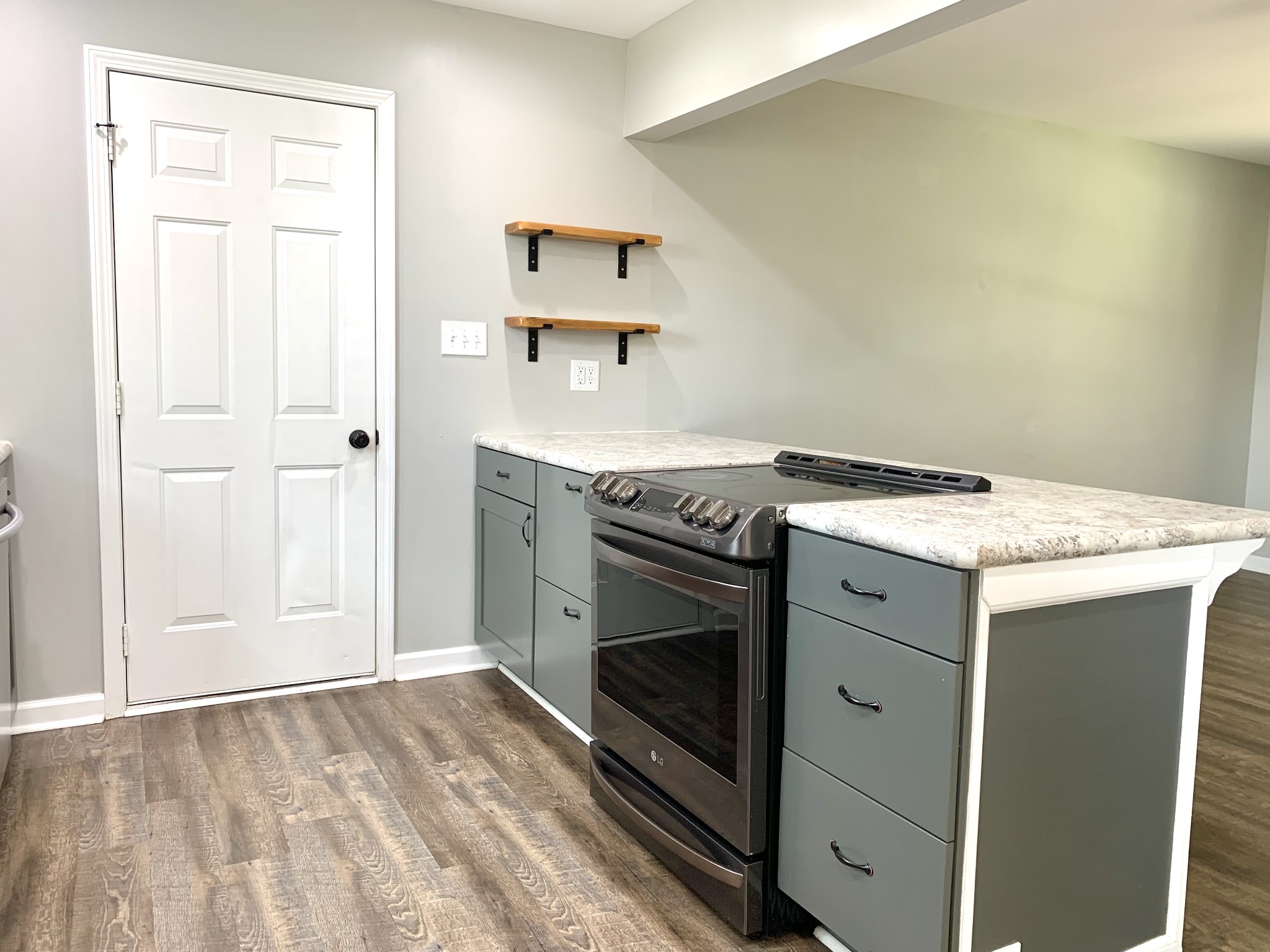 819 Stableford Road Oak Grove, KY 42262 - Photo 12 of 50 a kitchen with granite countertop a sink stainless steel appliances and white cabinets