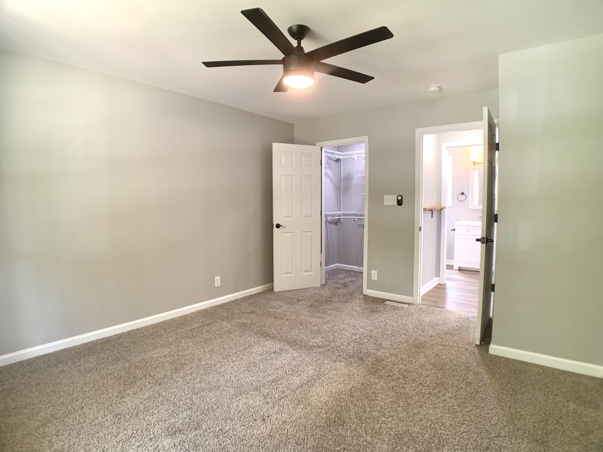 819 Stableford Road Oak Grove, KY 42262 - Photo 19 of 50 an empty room with closet and a ceiling fan