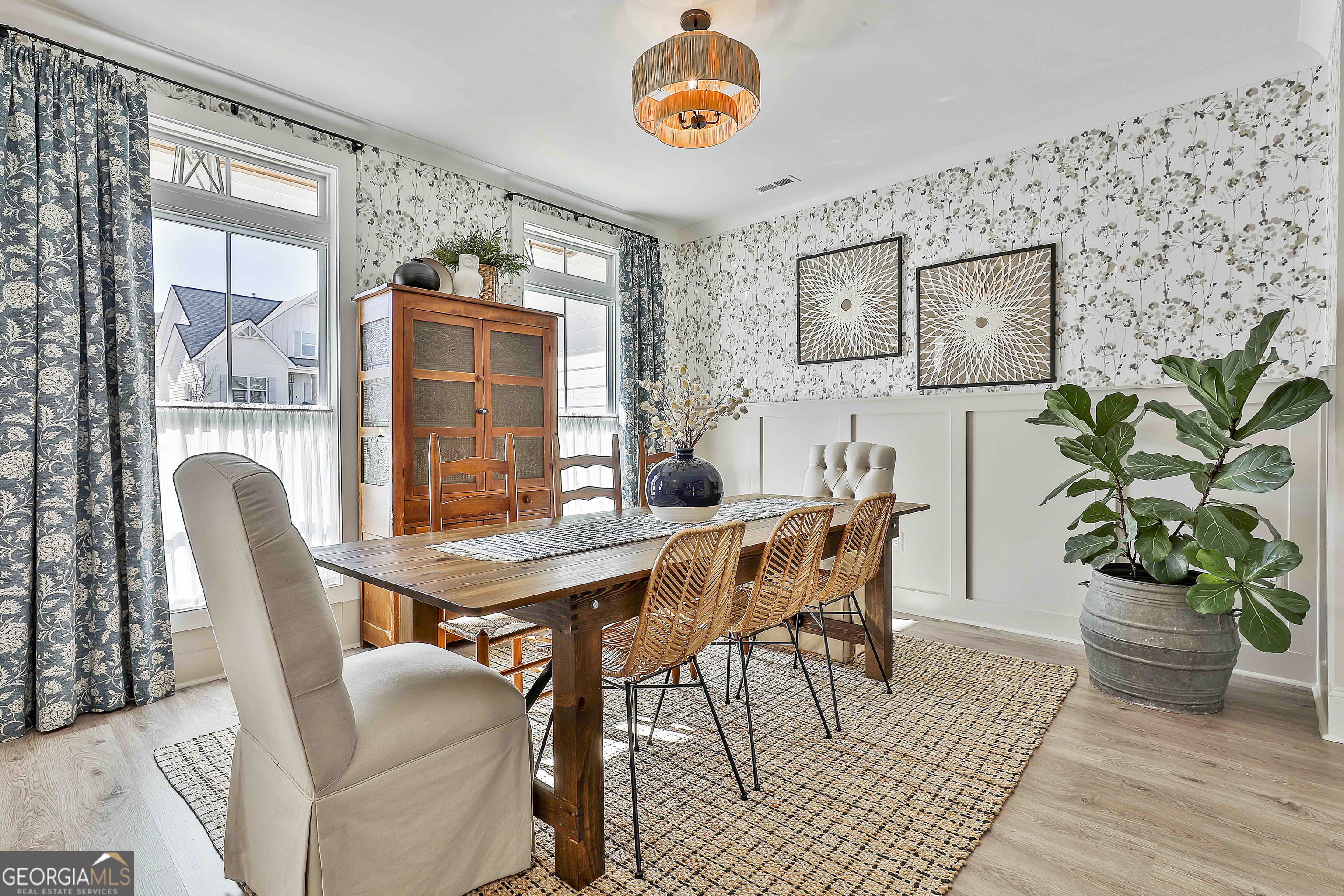 335 Werner Way Senoia, GA 30276 - Photo 11 of 51 a dining room with furniture and wooden floor