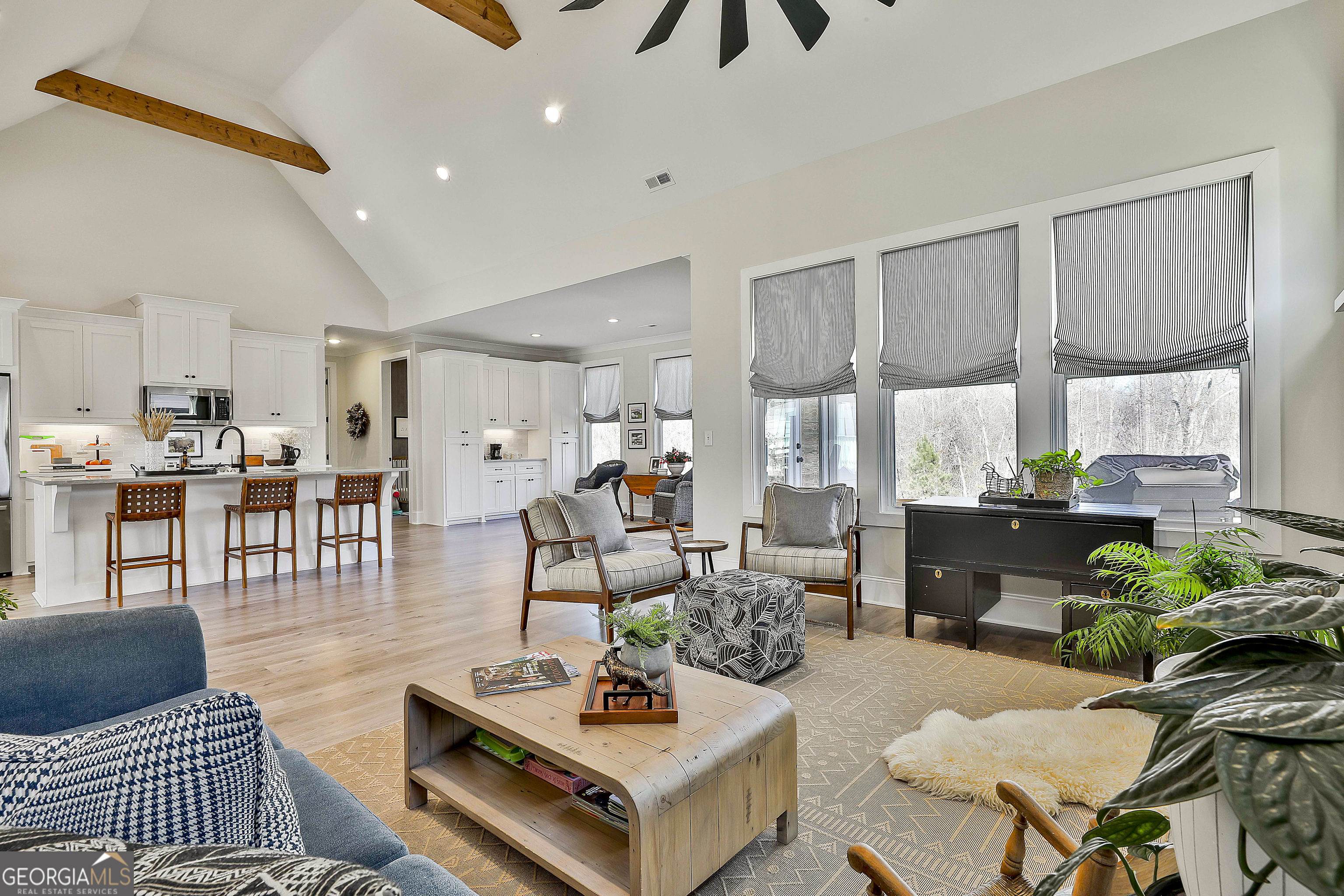 335 Werner Way Senoia, GA 30276 - Photo 26 of 51 a living room with furniture and a large window
