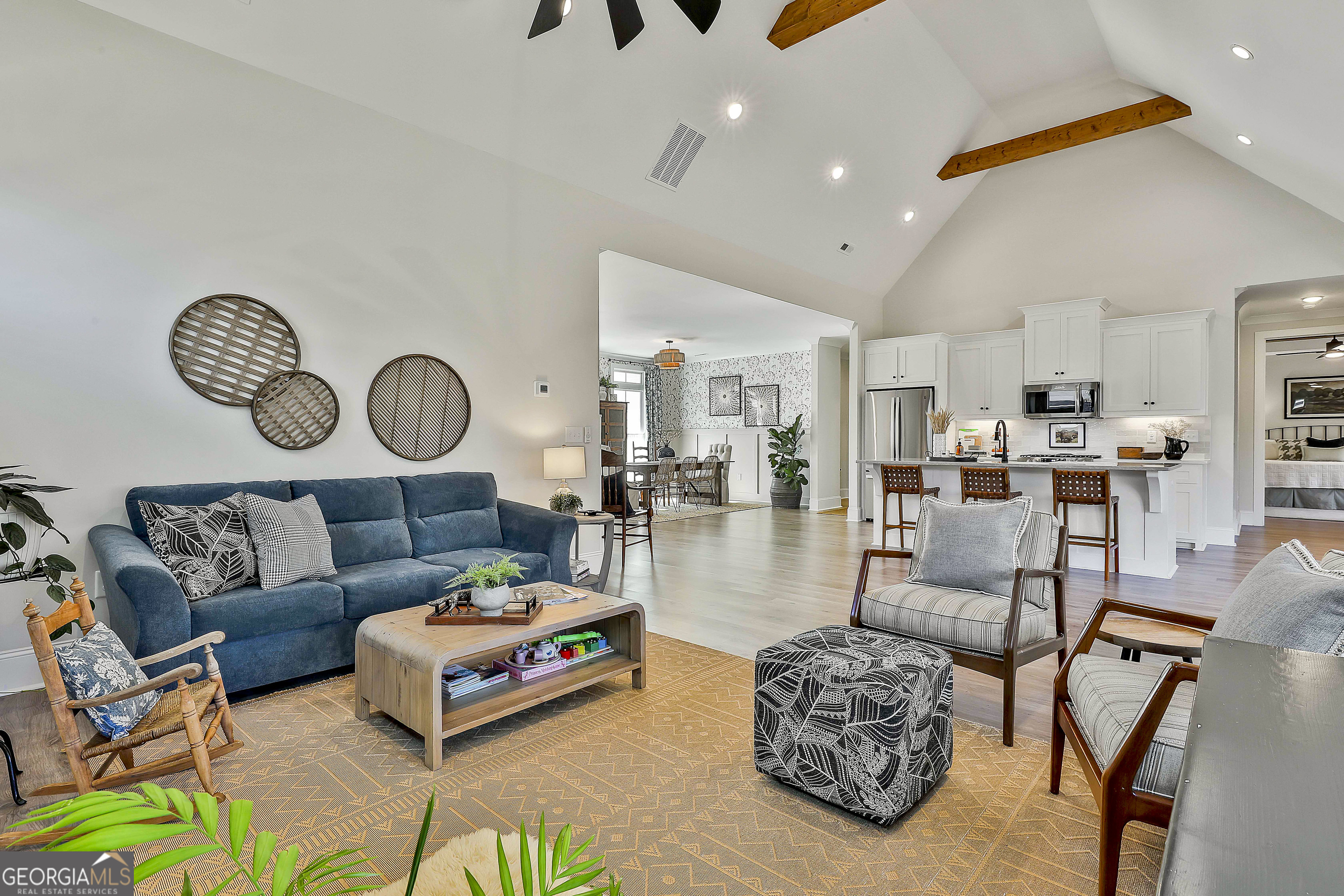335 Werner Way Senoia, GA 30276 - Photo 27 of 51 a living room with furniture kitchen view and a table