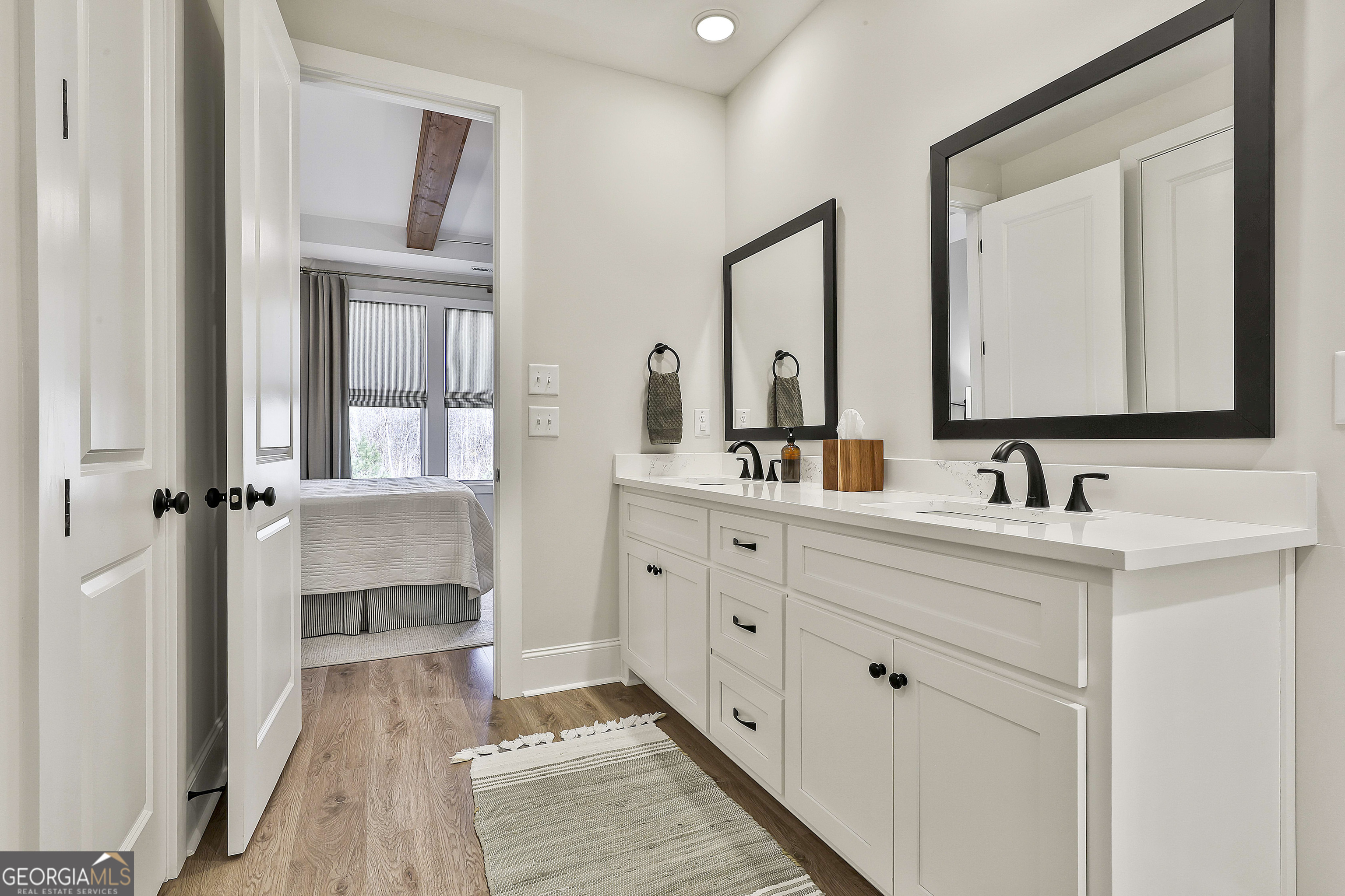335 Werner Way Senoia, GA 30276 - Photo 34 of 51 a spacious bathroom with a double vanity sink mirror and