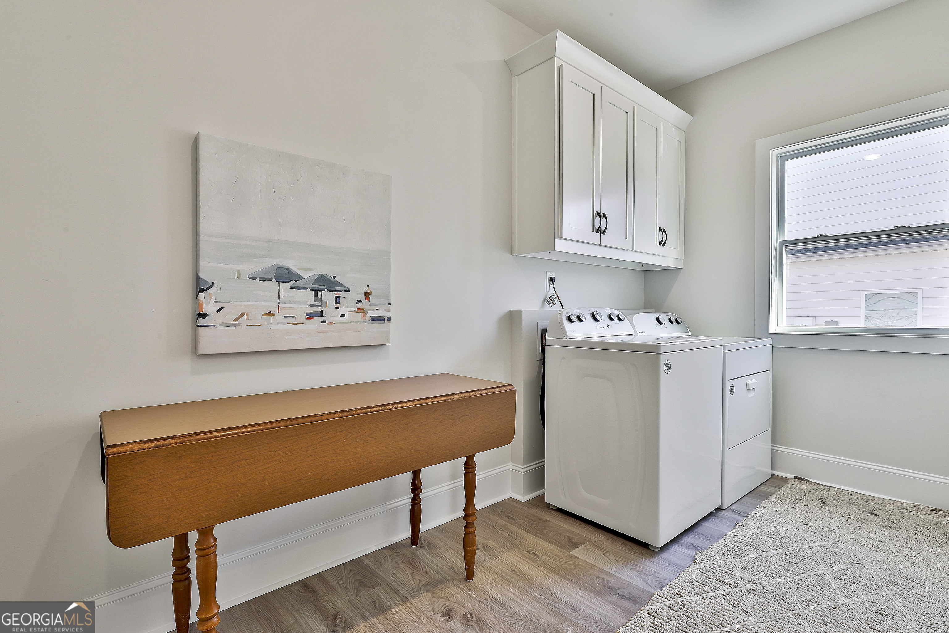 335 Werner Way Senoia, GA 30276 - Photo 37 of 51 a room with cabinets and wooden floor