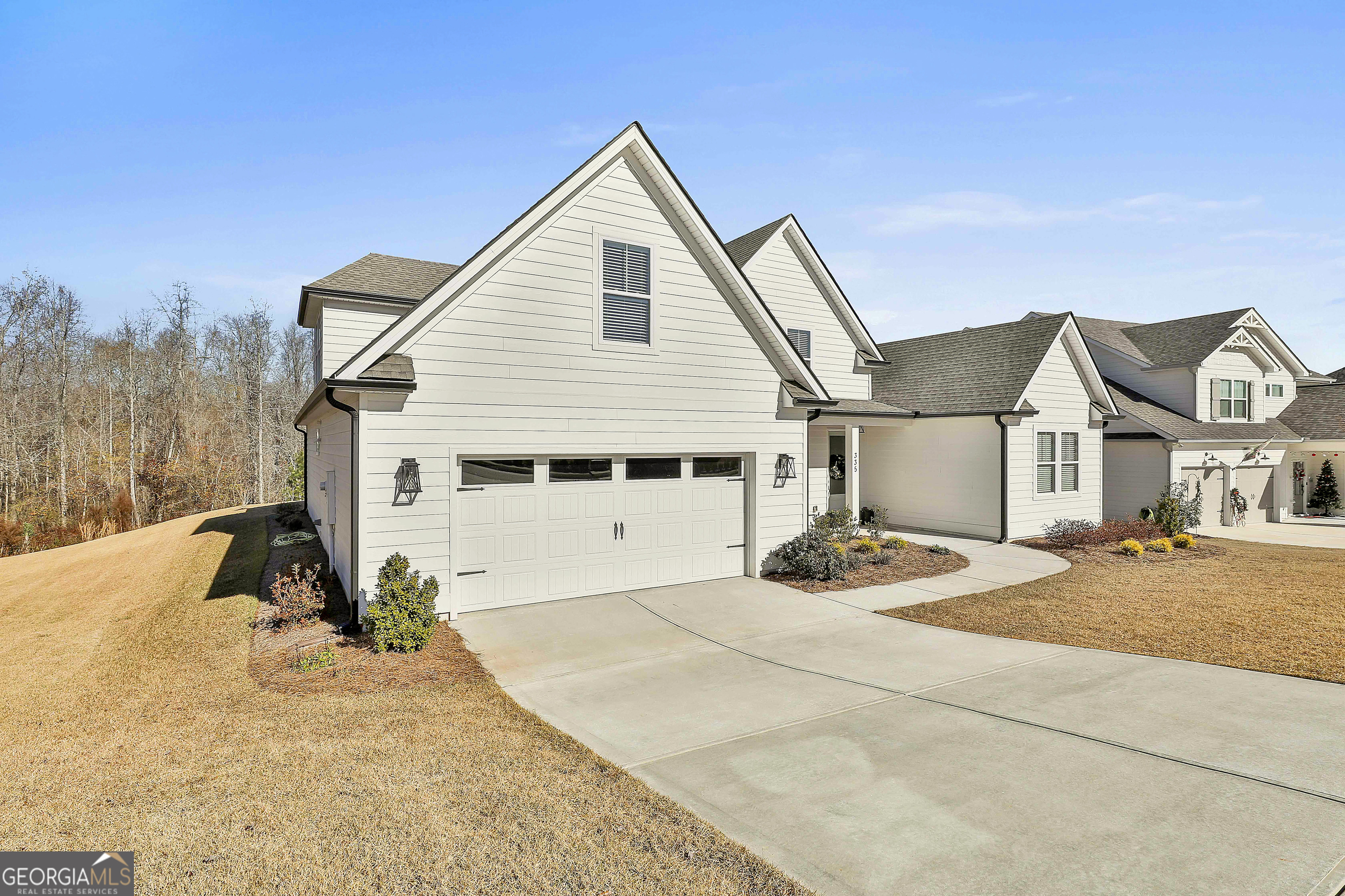 335 Werner Way Senoia, GA 30276 - Photo 4 of 51 a view of a house with a patio