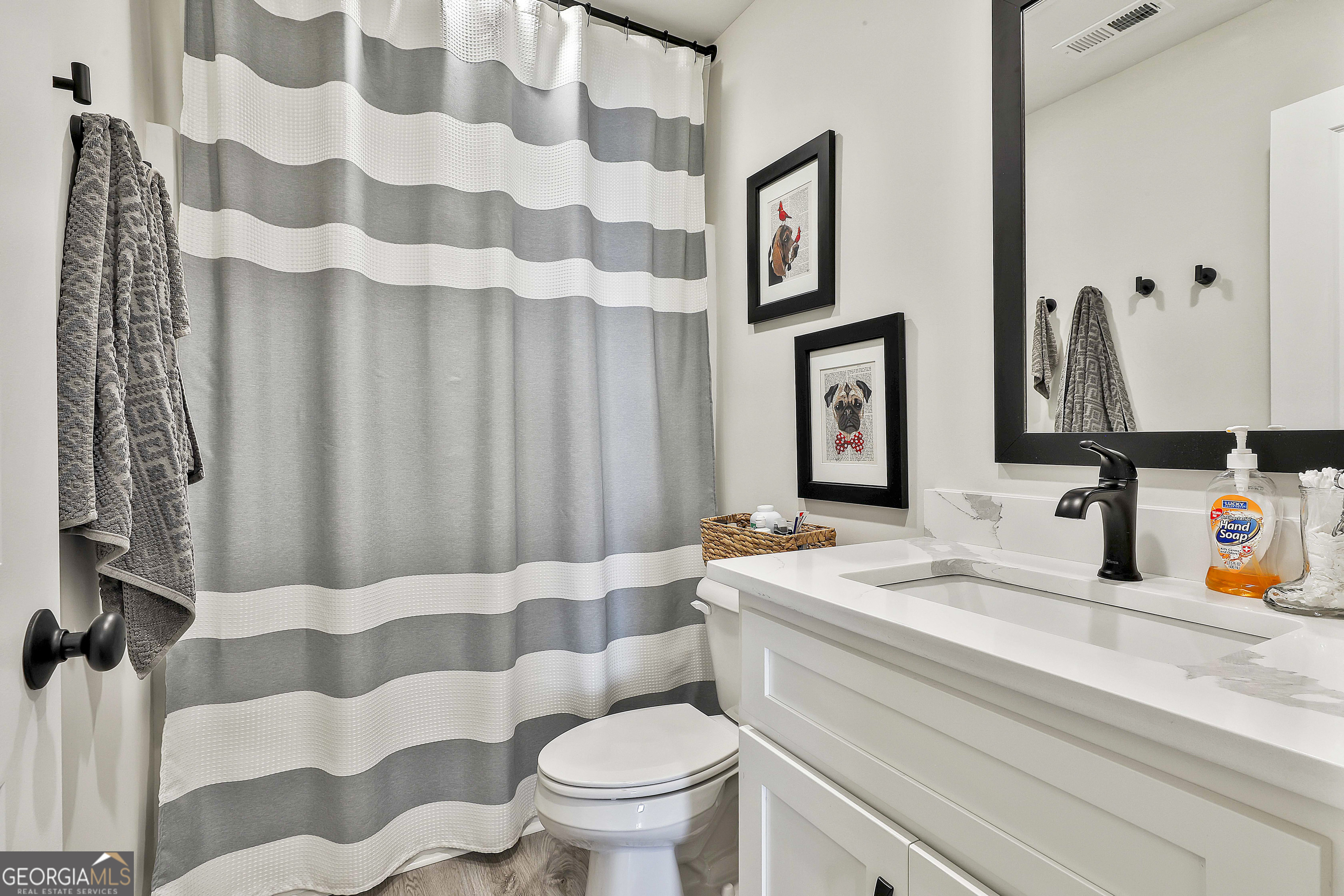 335 Werner Way Senoia, GA 30276 - Photo 44 of 51 a bathroom with a sink toilet and shower