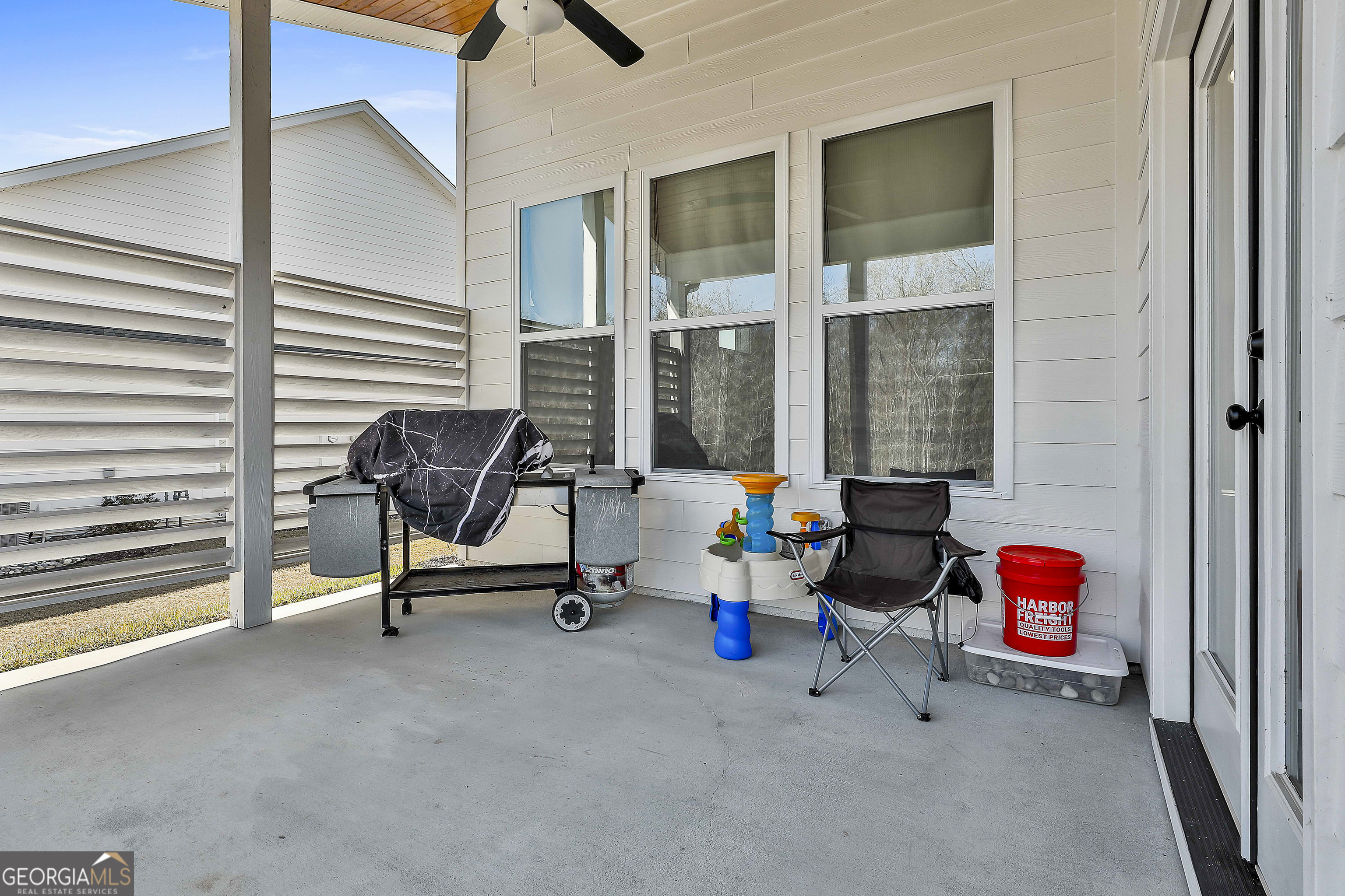 335 Werner Way Senoia, GA 30276 - Photo 46 of 51 a living room with patio area