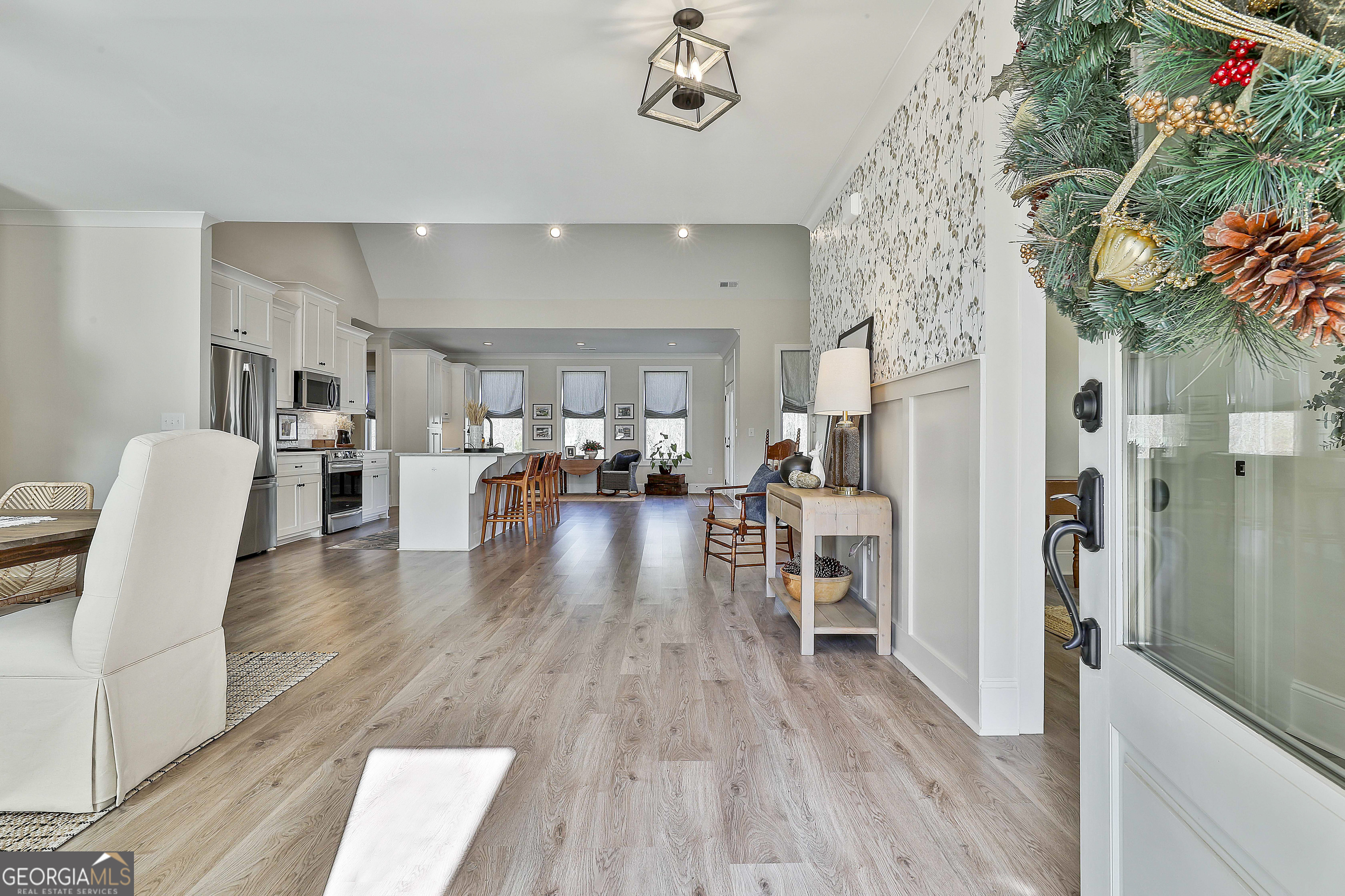 335 Werner Way Senoia, GA 30276 - Photo 8 of 51 a living room with furniture and a wooden floor