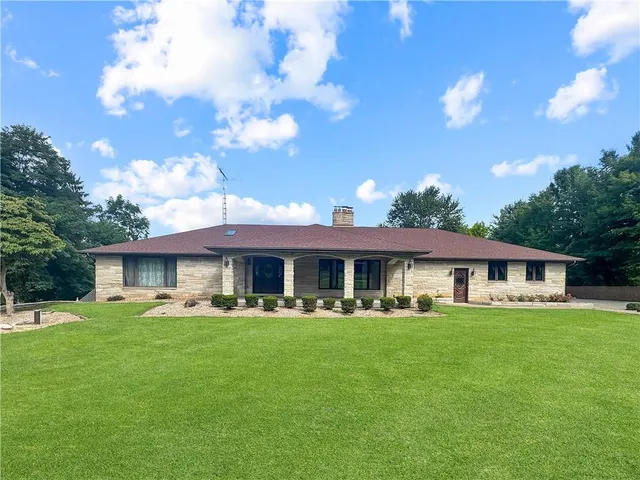 a front view of house with yard