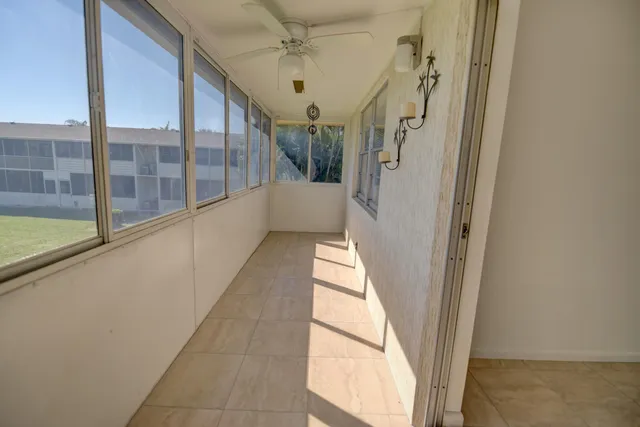 a front view of a house with swimming pool