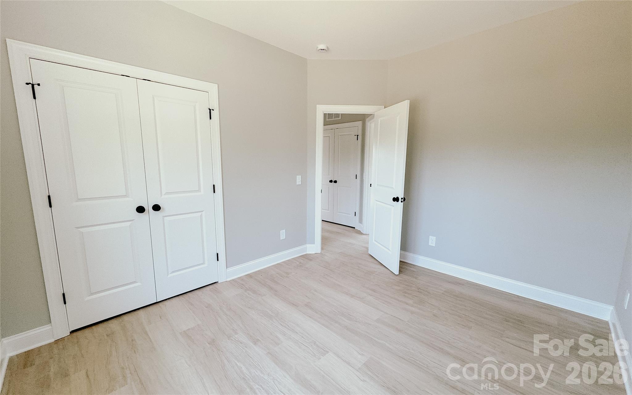 1455 West Ridge Road Salisbury, NC 28147 - Photo 18 of 26 a view of an empty room with wooden floor