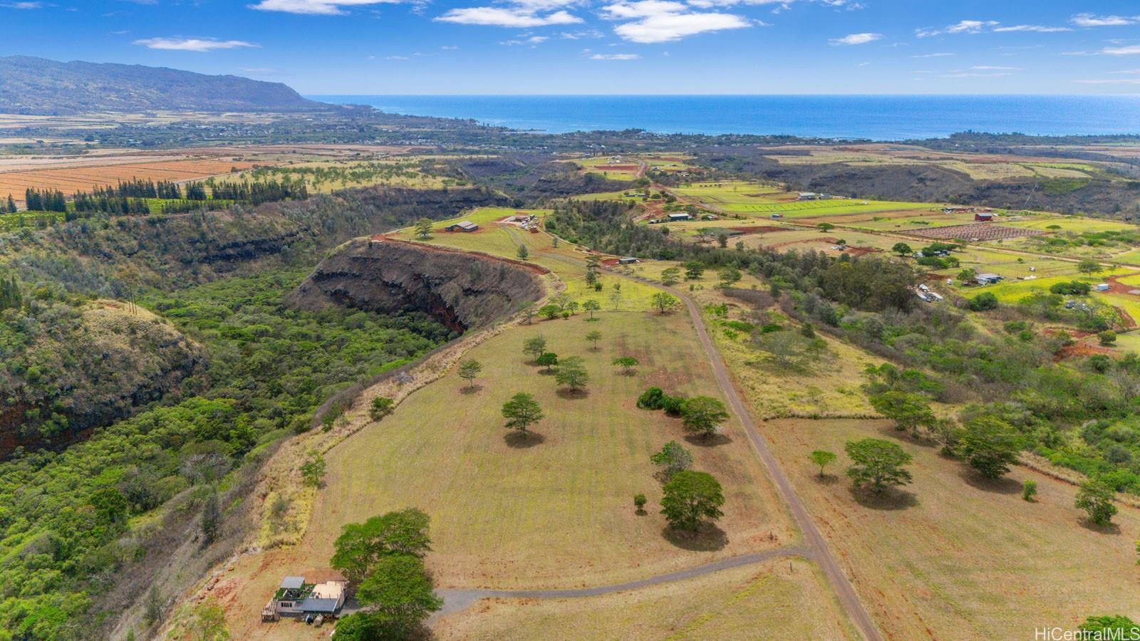 64-486 Kamehameha Highway, Unit 34F Haleiwa, HI 96712 - Photo 14 of 25 a view of an ocean and a mountain