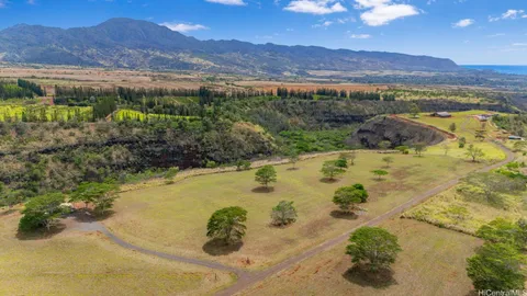 a view of a backyard with mountain view